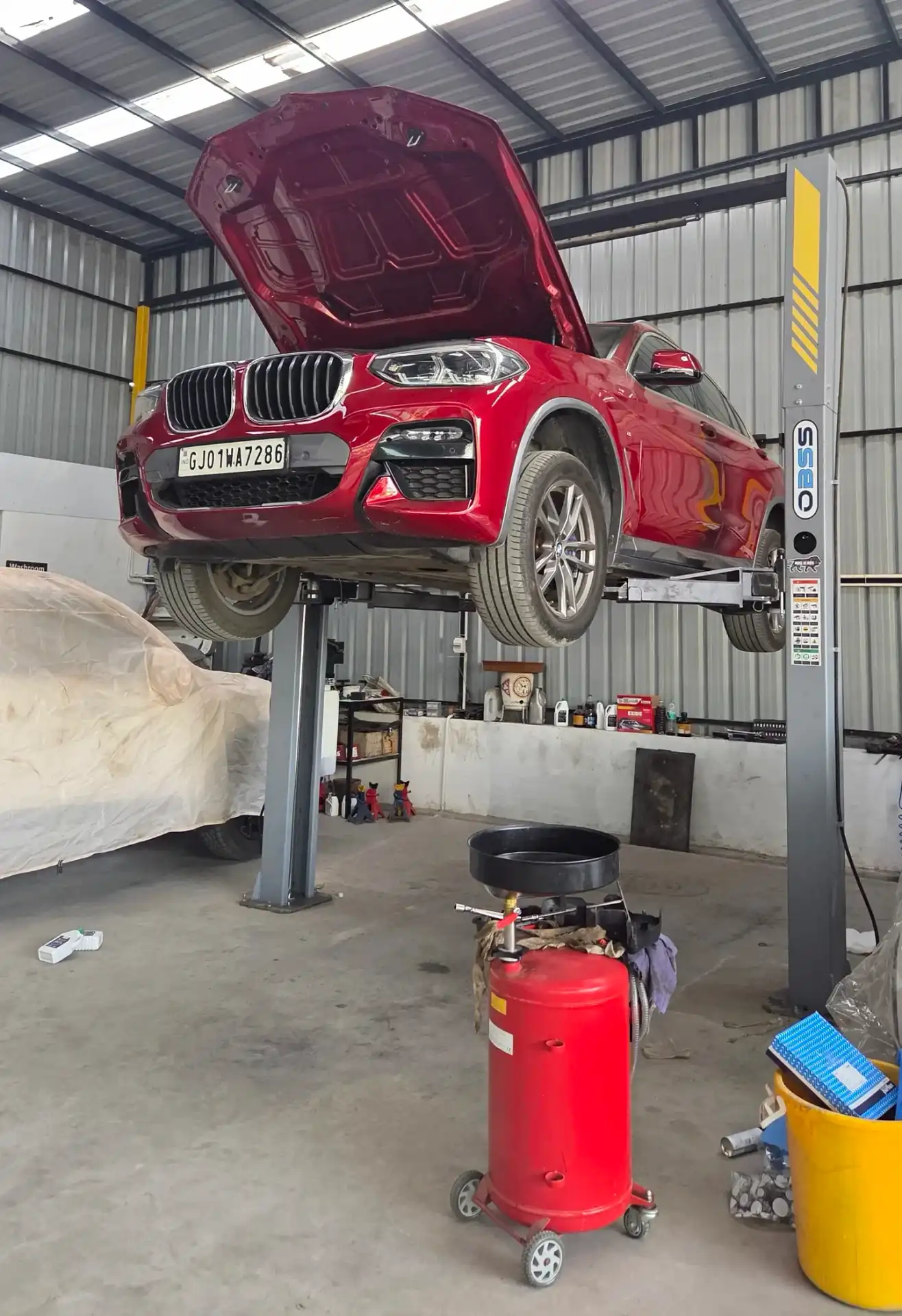 Periodic maintenance service Hyundai vehicle at a professional car workshop