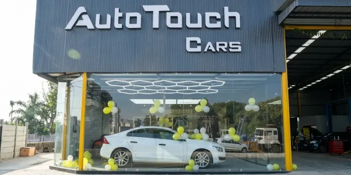 Best Car Studio showroom with luxury white car display at Auto Touch Cars